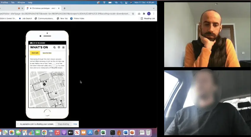 Mario interviewing a person in front of a mobile prototype